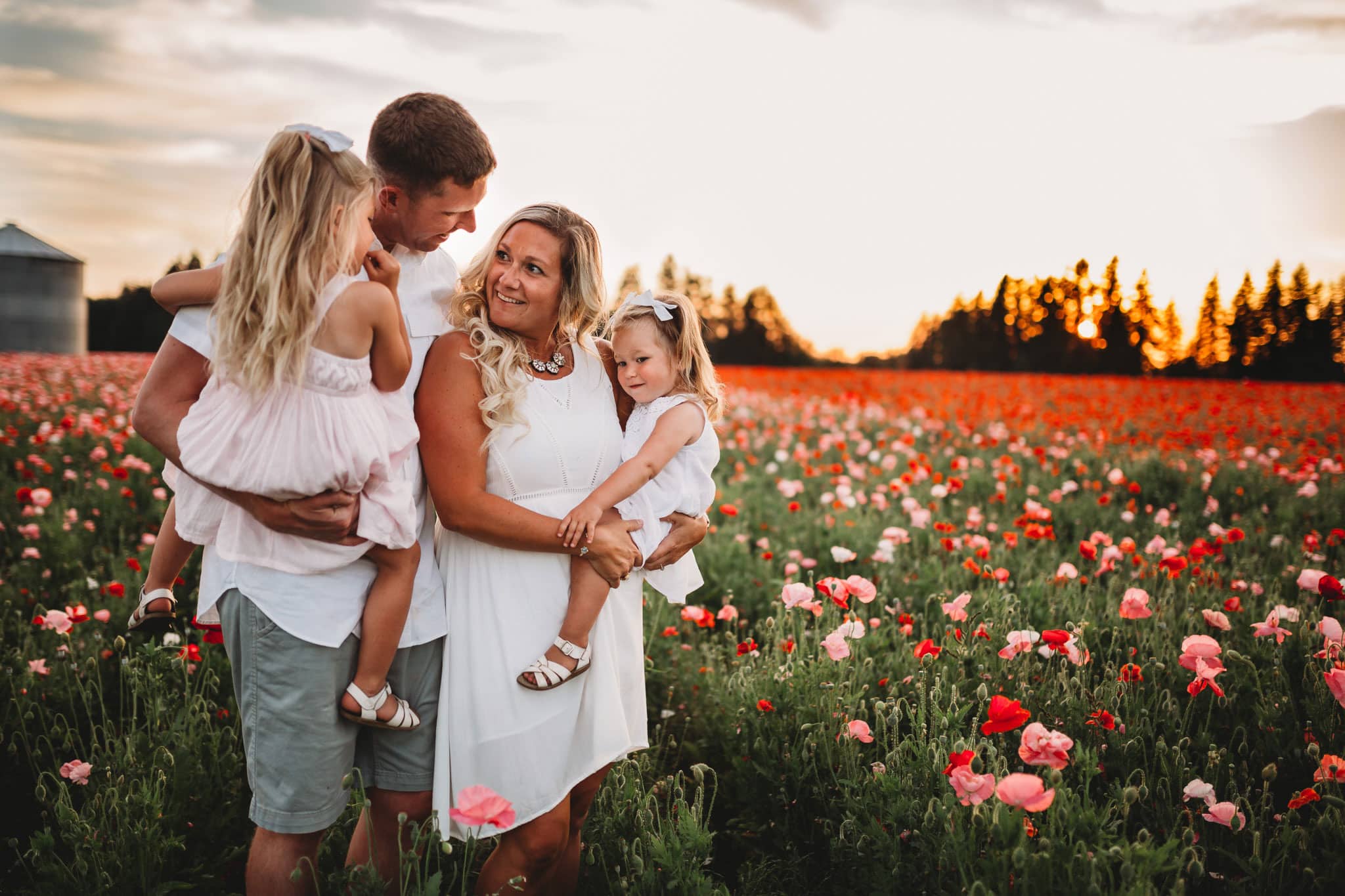 Family of four standing in a field of flowers in portland oregon - Oregon Poppy Fields