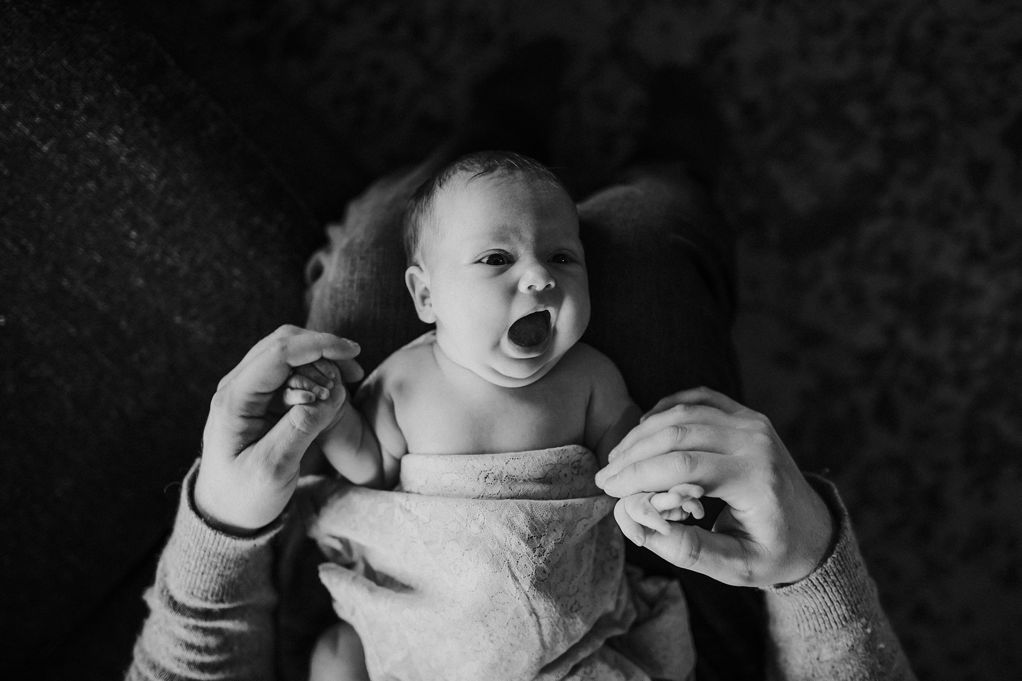 yawning baby at lifestyle newborn photography session