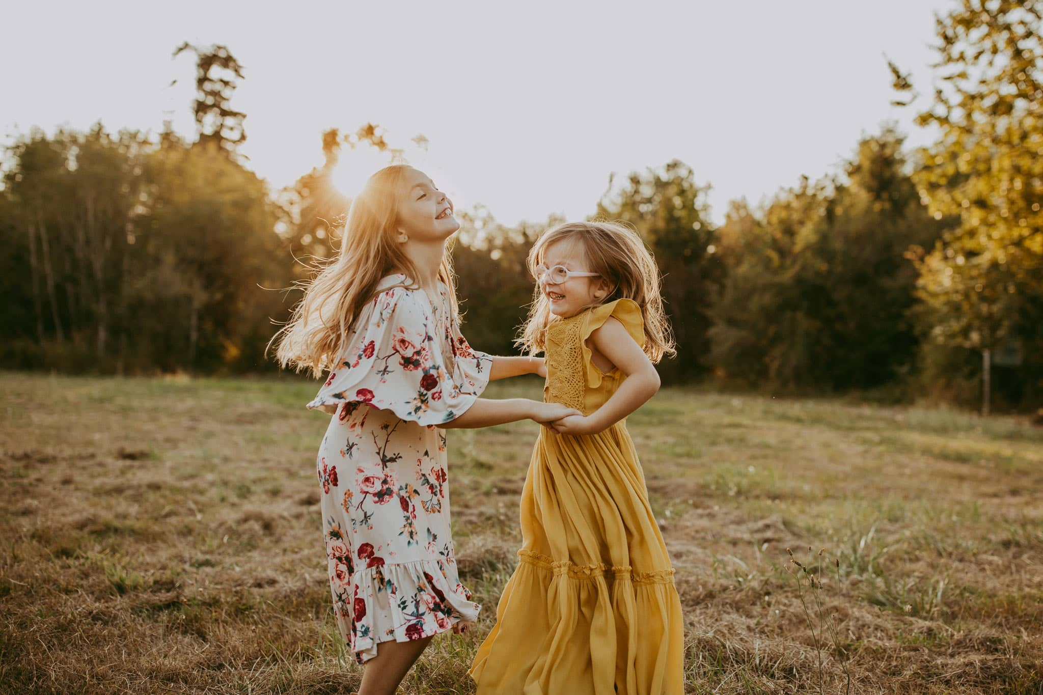 little girls dancing and playing together - must have photos for family photo session
