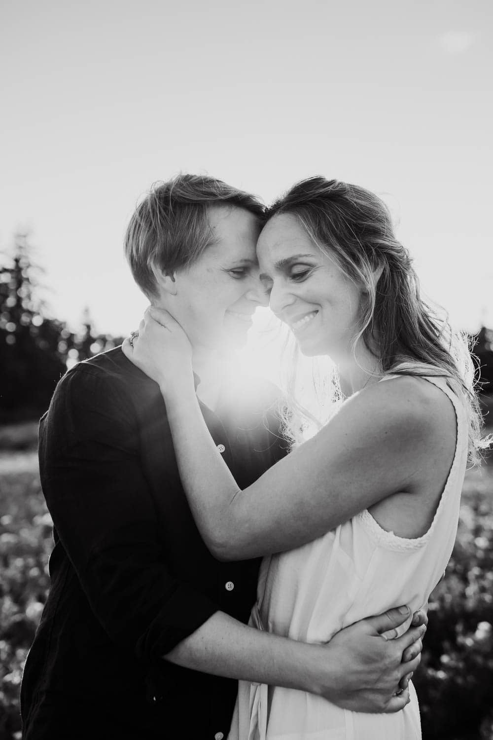 black and white image of a couple embracing