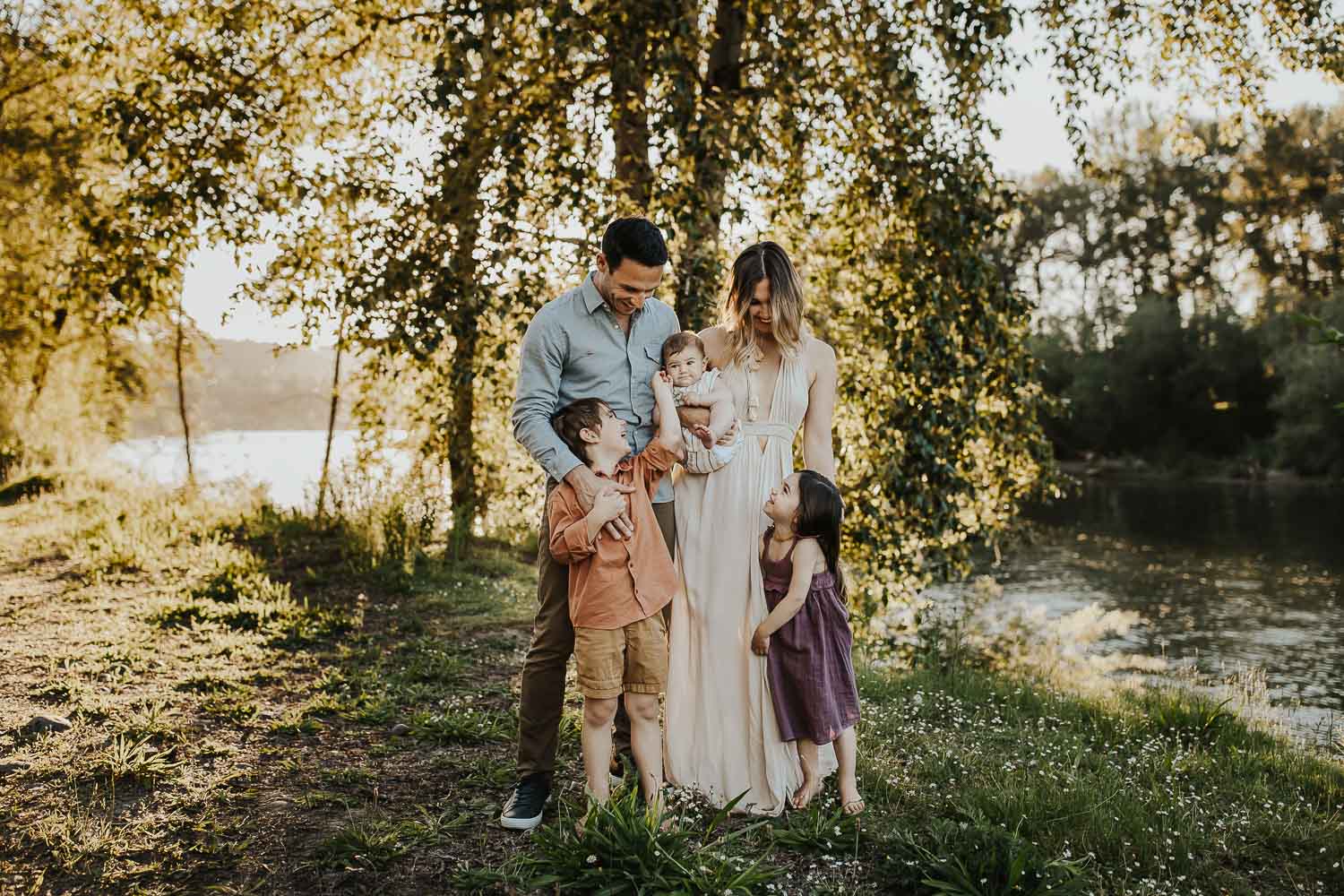 family standing together and laughing in Oregon City - What to wear for family photos