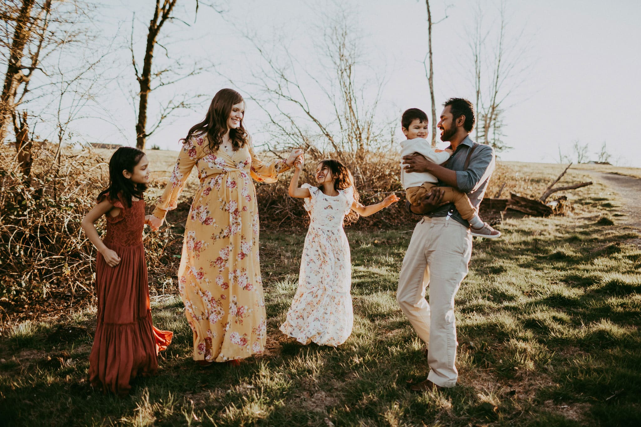 Family dancing together - ideas for what to wear to family photos