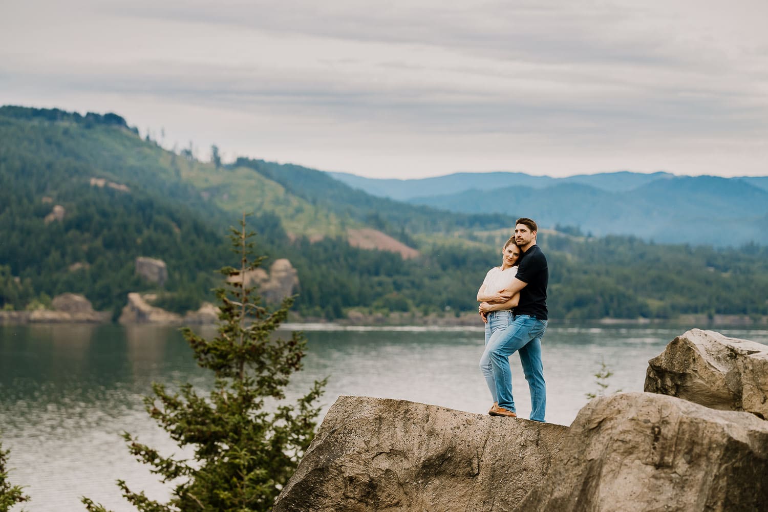 couple on rock, edited with lightroom presets for cloudy days
