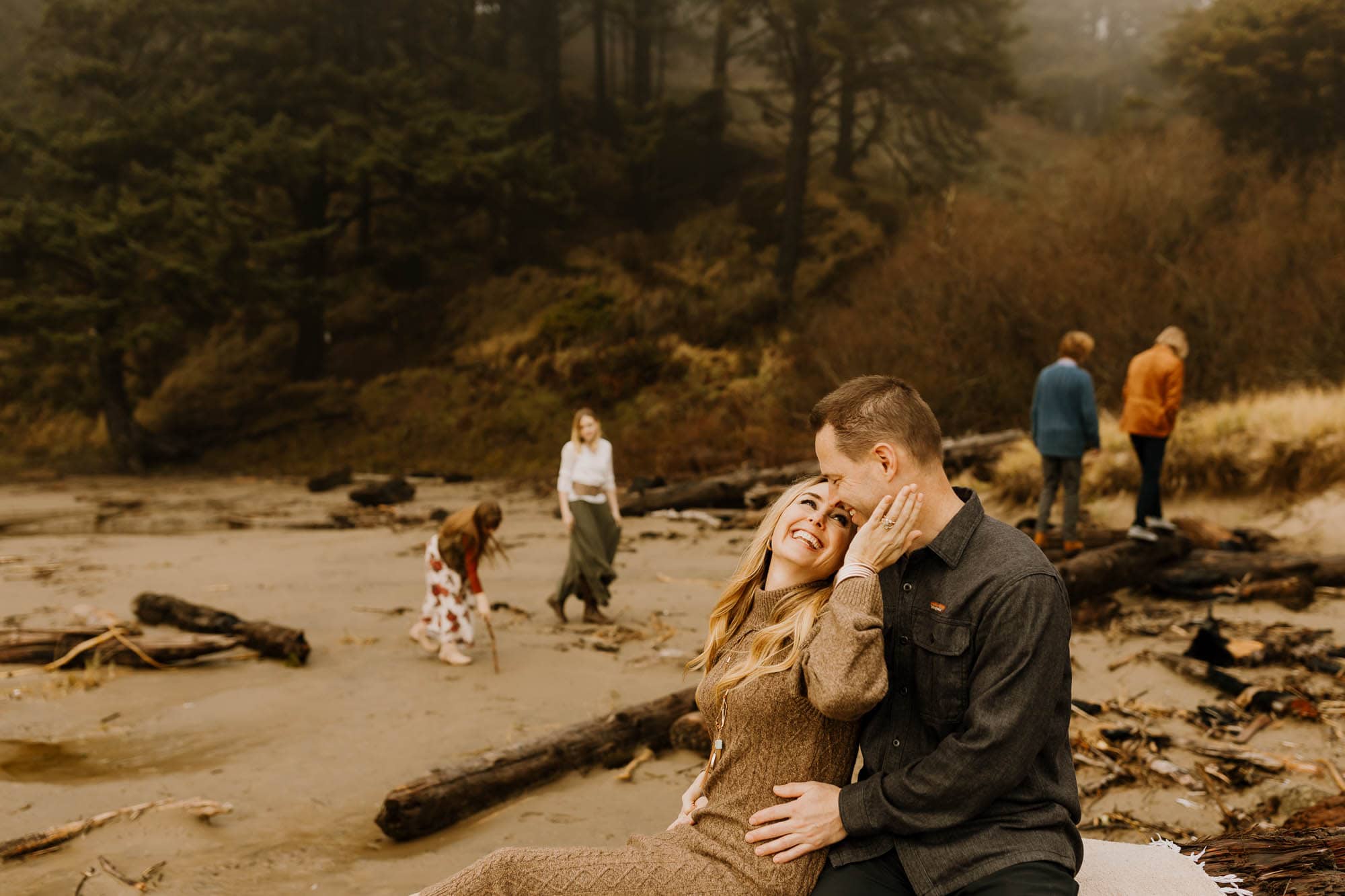 cannon beach family playing at the beach together - family photographer on the oregon coast
