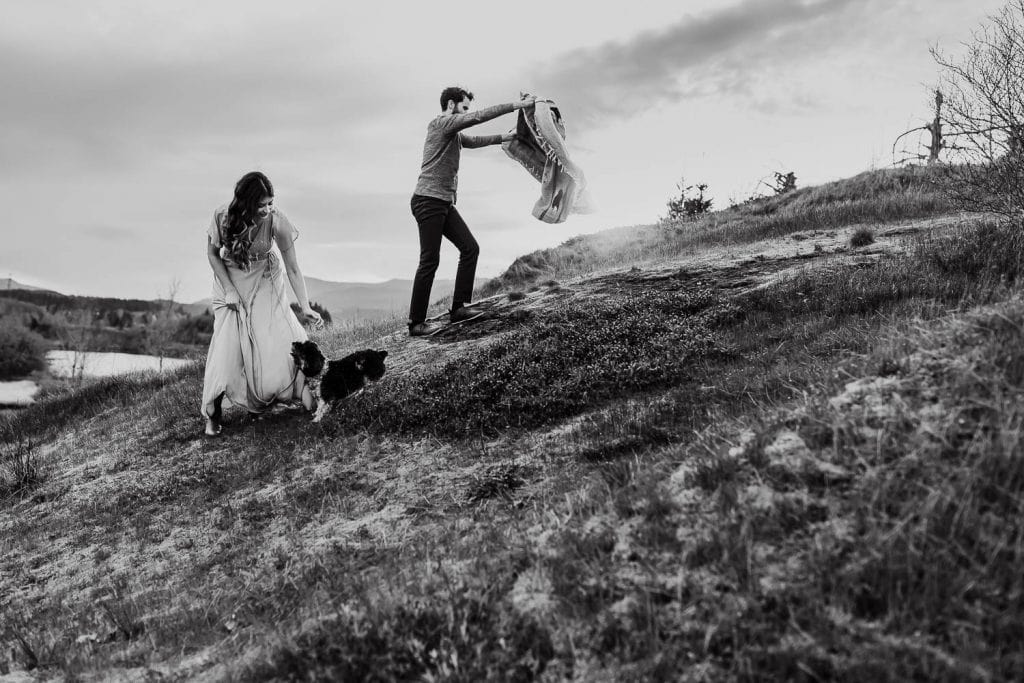 Couple out adventuring with their dog during photo session