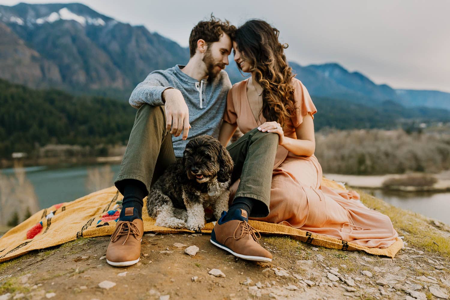 couple and their puppy during adventure photos