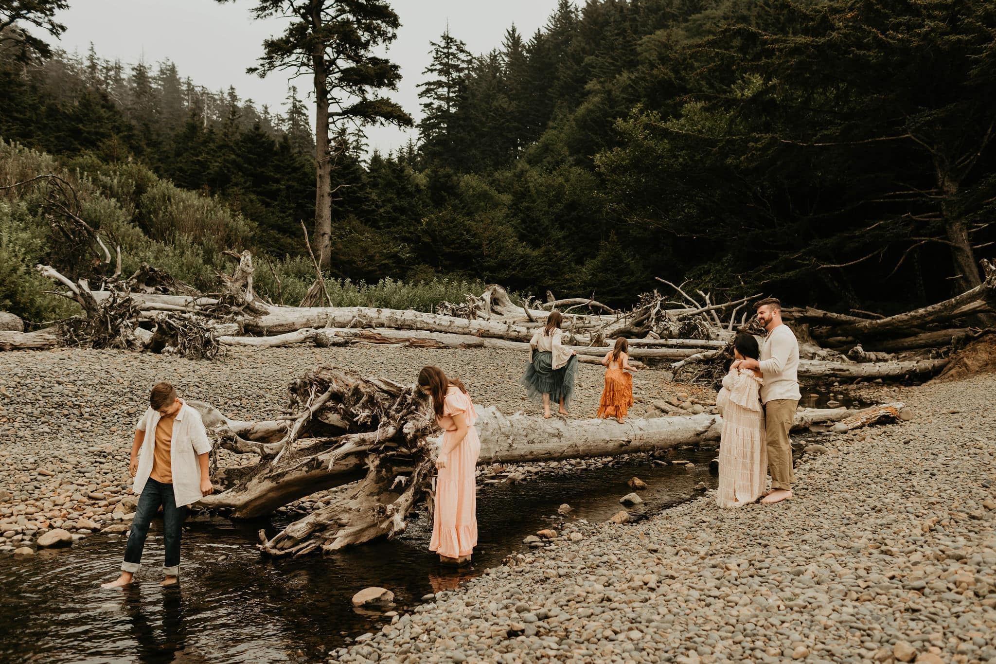 Large family playing by a river in Washington