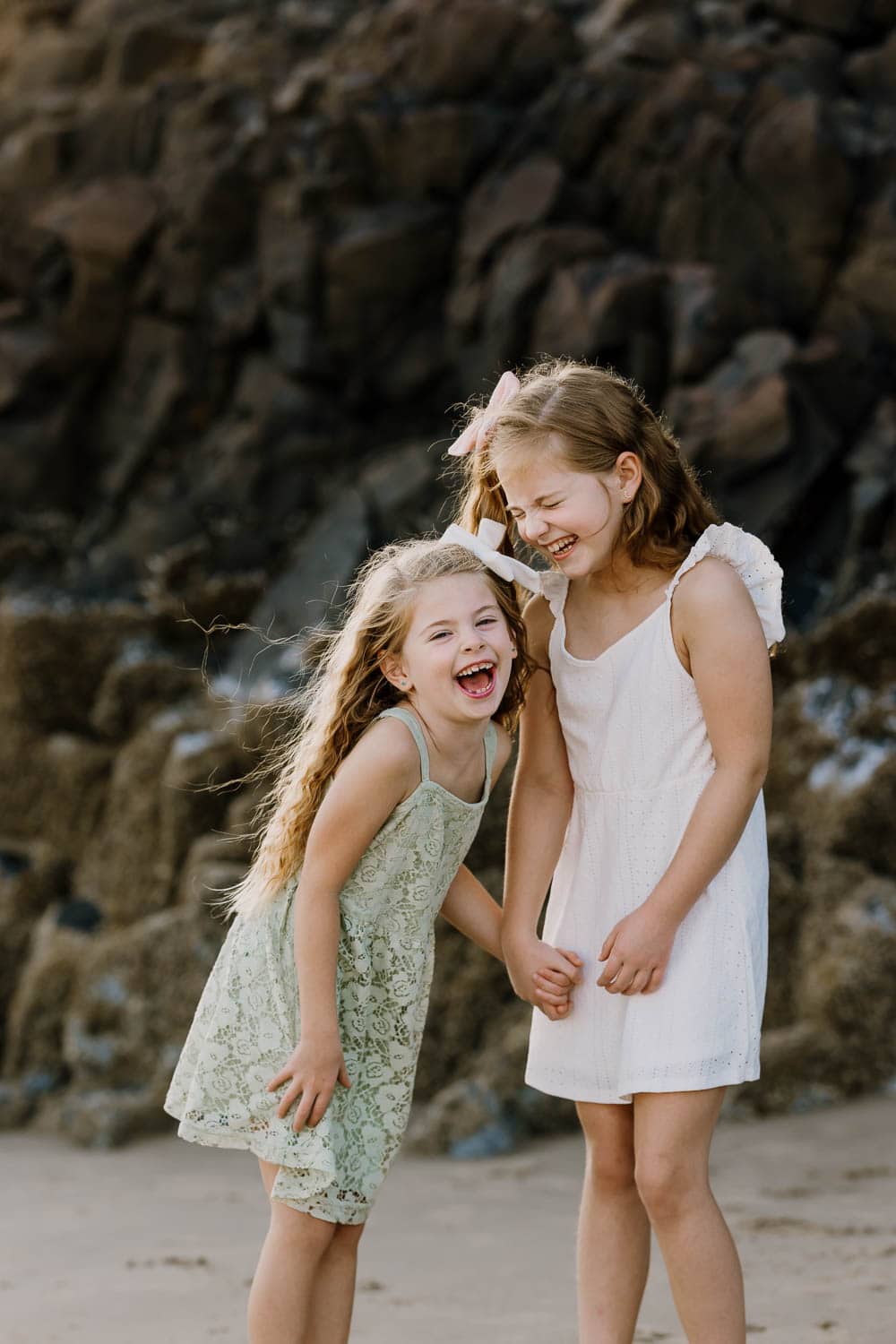 sisters laughing together