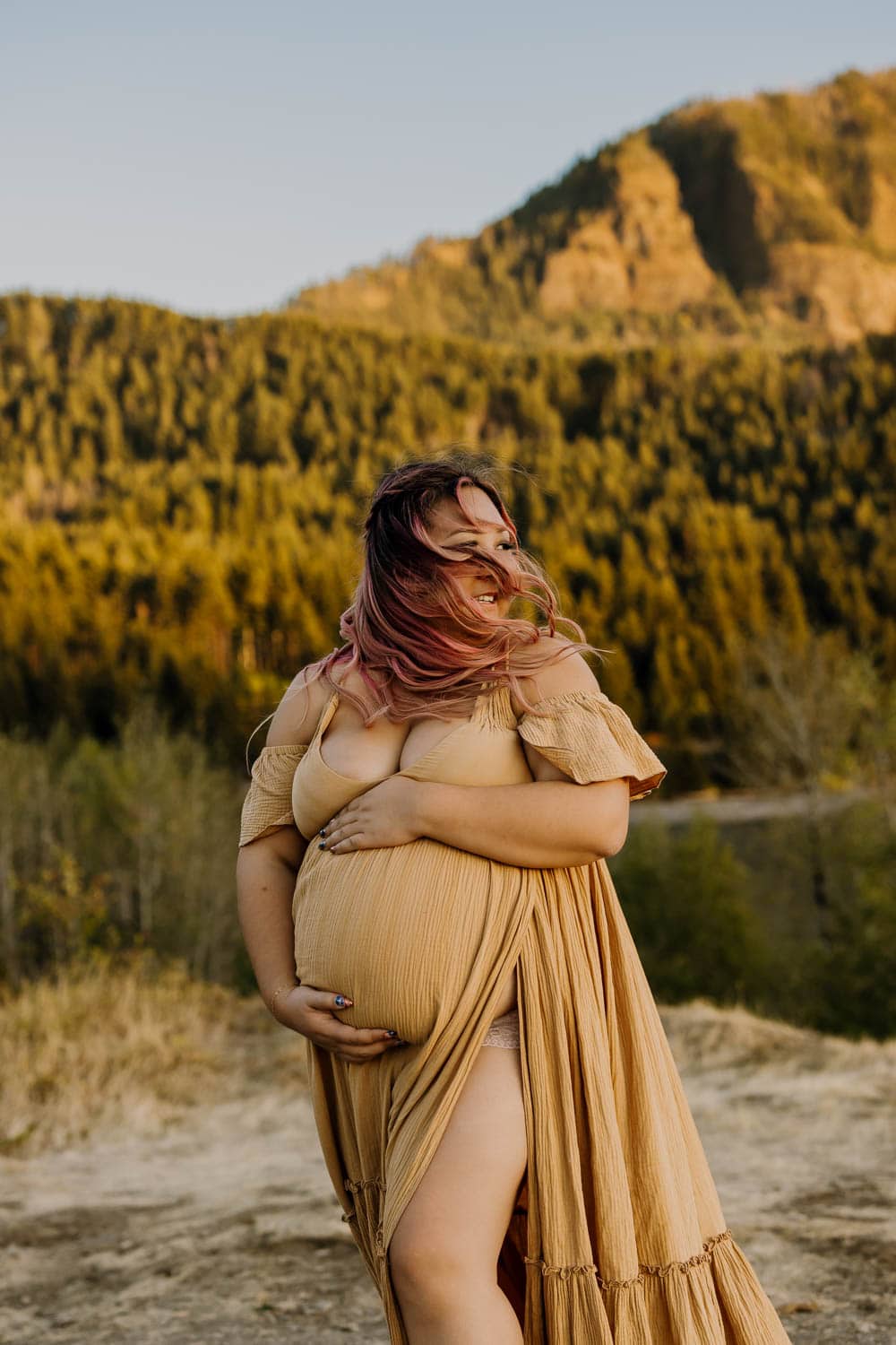 Pregnant woman with pink hair